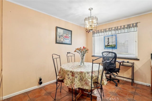 dining area featuring tile patterned floors and a notable chandelier