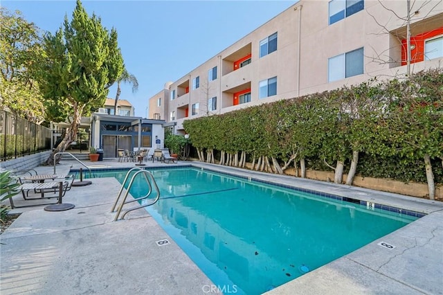 view of pool with a patio area