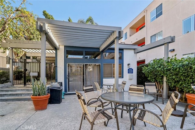 view of patio featuring a pergola