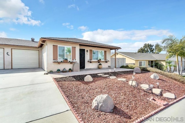 ranch-style home with a garage