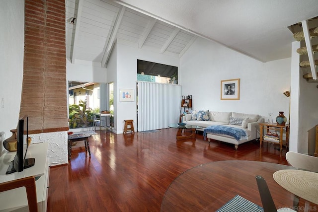 living room with wood ceiling, hardwood / wood-style flooring, high vaulted ceiling, and beamed ceiling