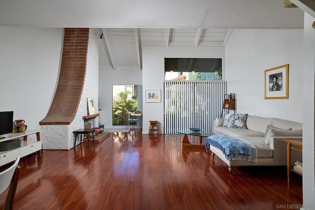 sitting room featuring hardwood / wood-style floors, wood ceiling, and lofted ceiling with beams