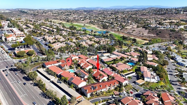 drone / aerial view featuring a mountain view