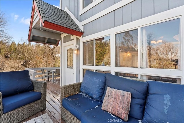 deck with an outdoor hangout area