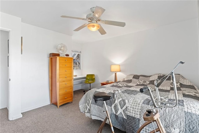 bedroom with ceiling fan and carpet flooring