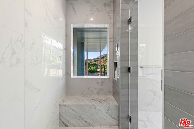 bathroom featuring walk in shower