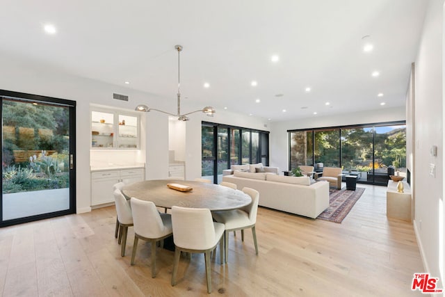 dining room featuring light hardwood / wood-style floors