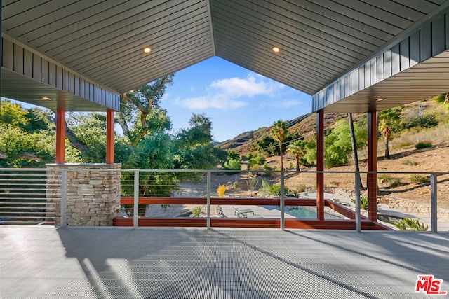 view of patio / terrace featuring a mountain view