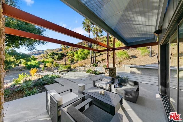 view of patio with a mountain view