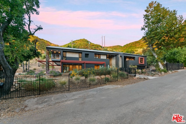 view of front of home with a mountain view