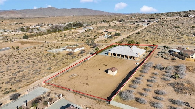 drone / aerial view featuring a mountain view