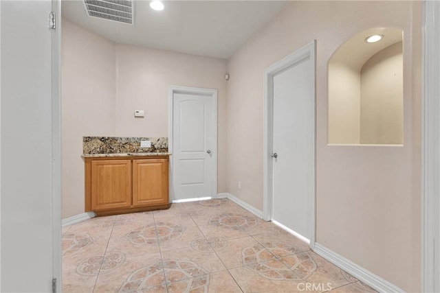 bathroom with tile patterned flooring