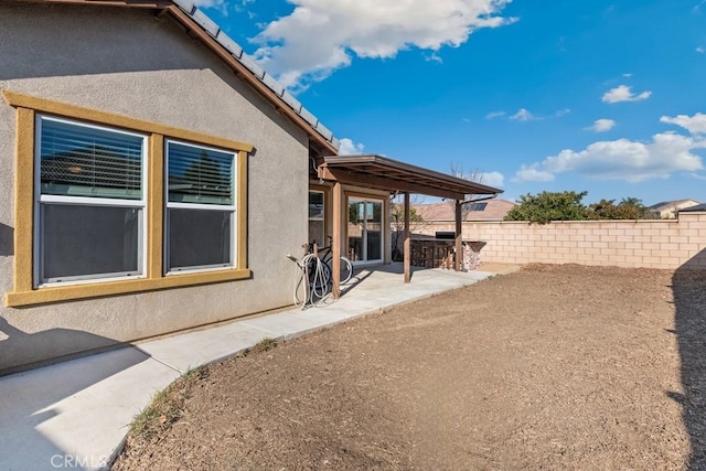 view of home's exterior featuring a patio area