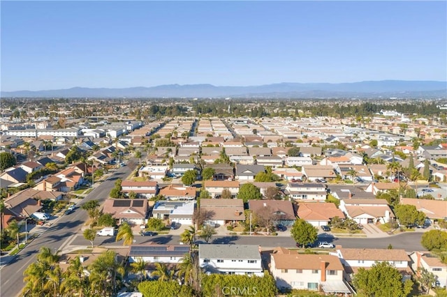 bird's eye view featuring a residential view and a mountain view