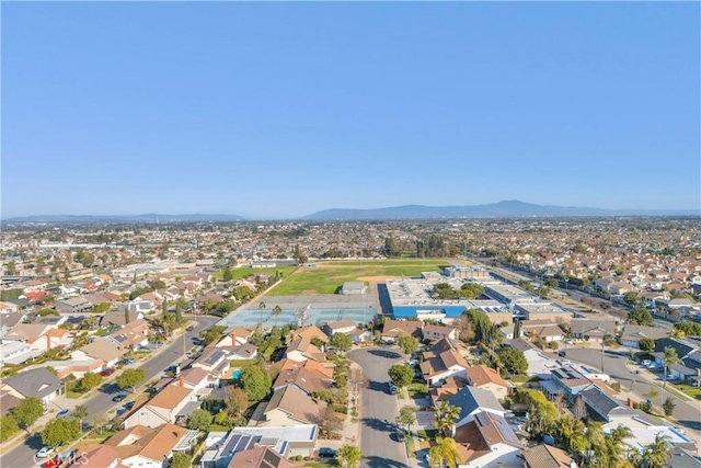 drone / aerial view with a residential view and a mountain view