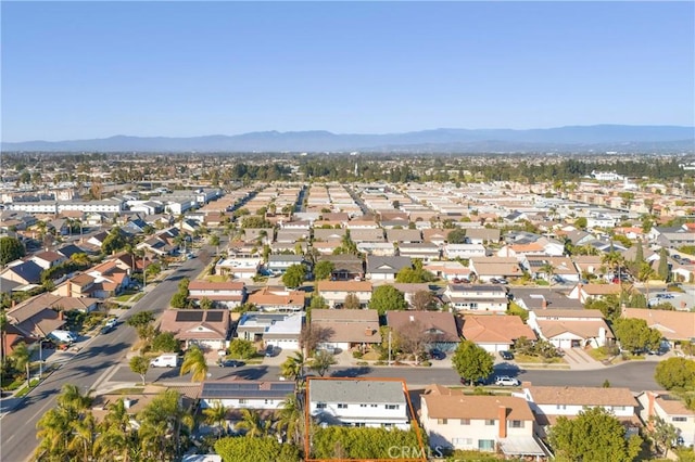 bird's eye view featuring a residential view and a mountain view