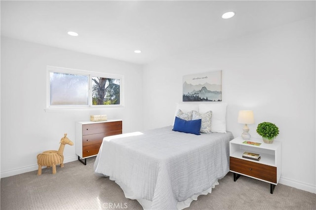 bedroom with light carpet, baseboards, and recessed lighting