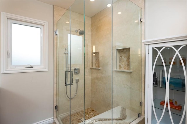 bathroom with an enclosed shower