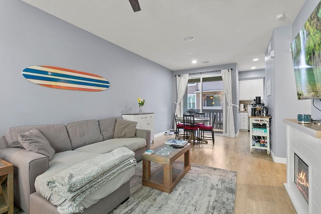 living room with light hardwood / wood-style floors