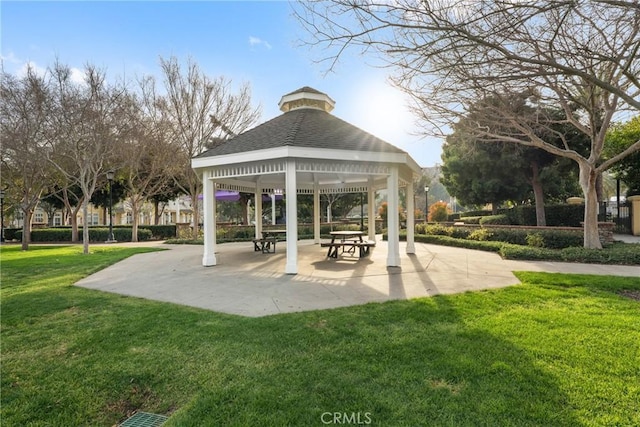 view of community featuring a yard and a gazebo