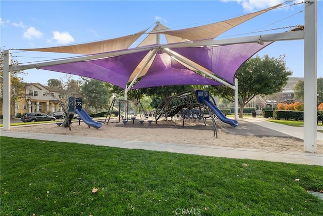 view of jungle gym featuring a yard