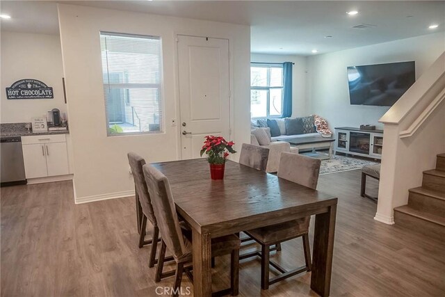 dining room with hardwood / wood-style floors