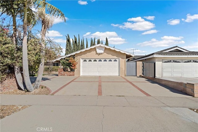 ranch-style home with a garage