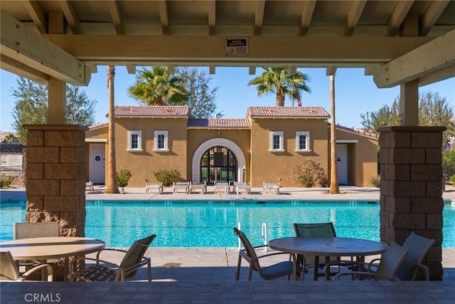 view of pool with a patio area