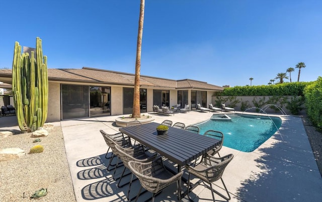 view of swimming pool with a patio area and pool water feature