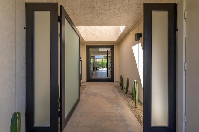 corridor featuring a skylight