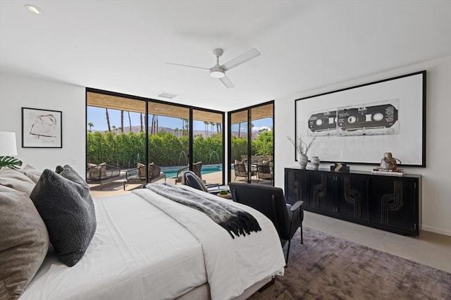 bedroom with ceiling fan, a wall of windows, multiple windows, and access to outside