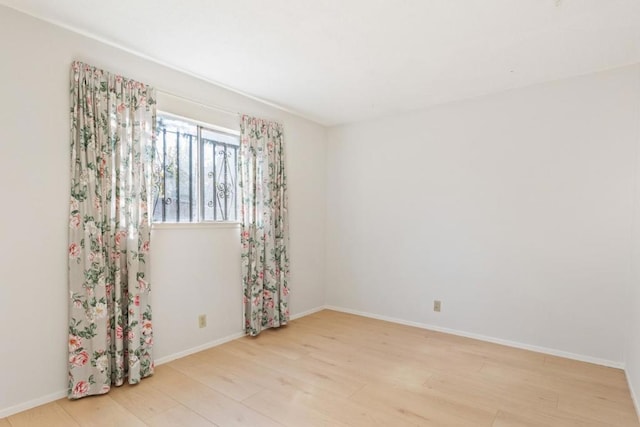 empty room featuring light hardwood / wood-style floors