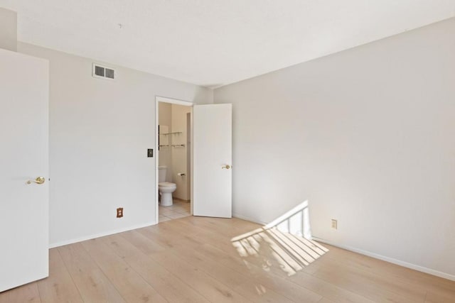 empty room featuring light hardwood / wood-style floors