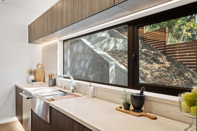 interior space with sink and hardwood / wood-style floors