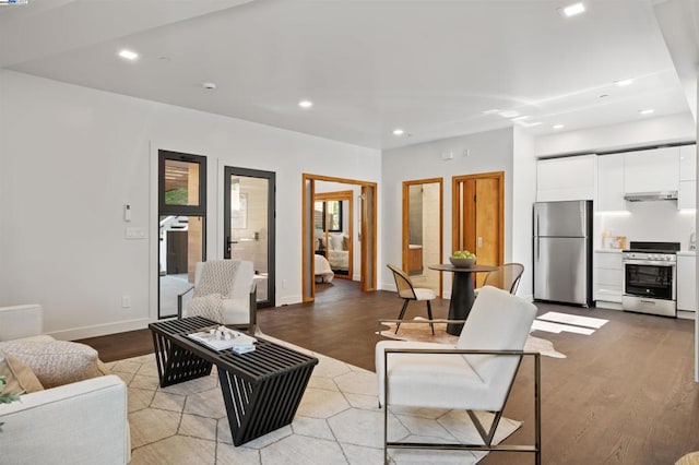 living room with light hardwood / wood-style flooring