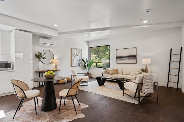 living room featuring a wall mounted AC and hardwood / wood-style floors