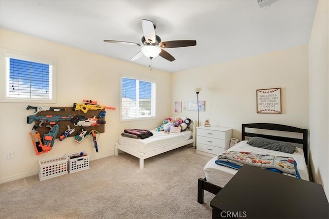 bedroom featuring baseboards, carpet, and ceiling fan