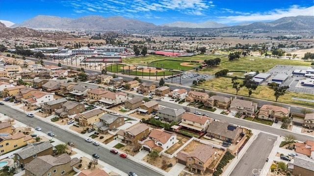 birds eye view of property featuring a mountain view and a residential view