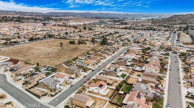 26605 Rose Bud Ln, Moreno Valley, CA 92555 - aerial overview of property's location with mountains and nearby suburban area
