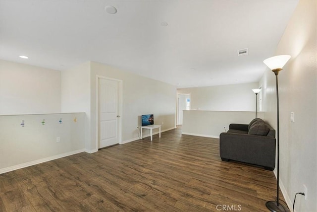 26605 Rose Bud Ln, Moreno Valley, CA 92555 - living area featuring visible vents, baseboards, recessed lighting, and wood finished floors