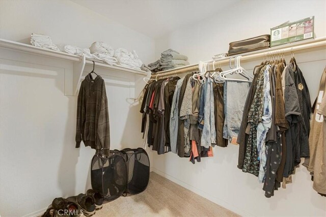 26605 Rose Bud Ln, Moreno Valley, CA 92555 - spacious closet featuring carpet flooring
