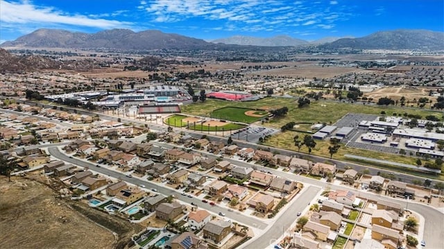 birds eye view of property featuring a mountain view