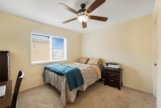 26605 Rose Bud Ln, Moreno Valley, CA 92555 - bedroom featuring light carpet, baseboards, and ceiling fan
