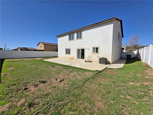 26605 Rose Bud Ln, Moreno Valley, CA 92555 - rear view of house with a patio area, a fenced backyard, and stucco siding