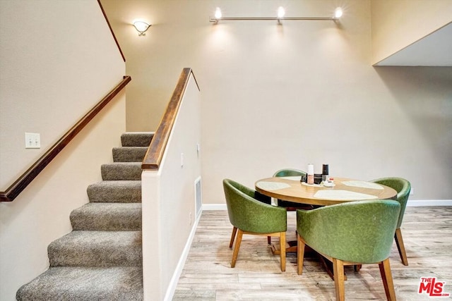 dining room featuring wood-type flooring