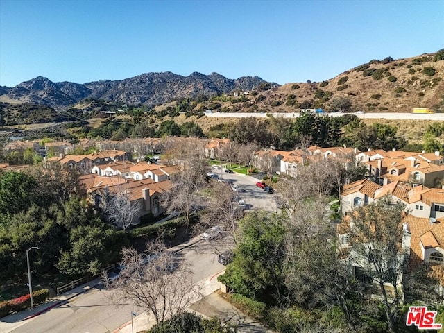 bird's eye view with a mountain view