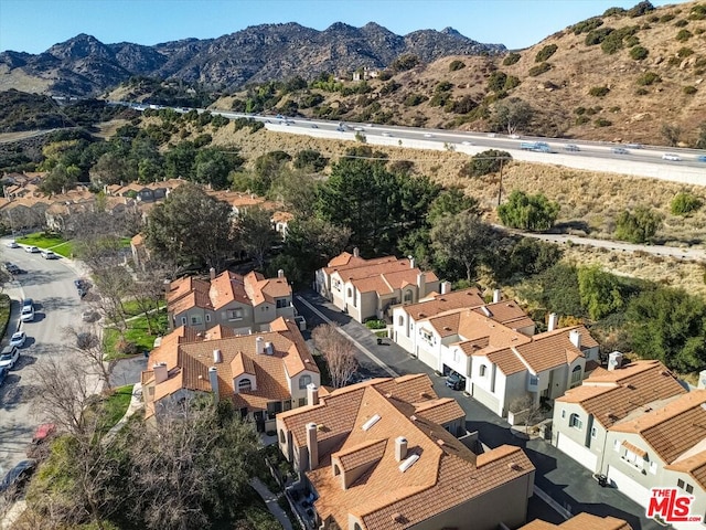 drone / aerial view featuring a mountain view