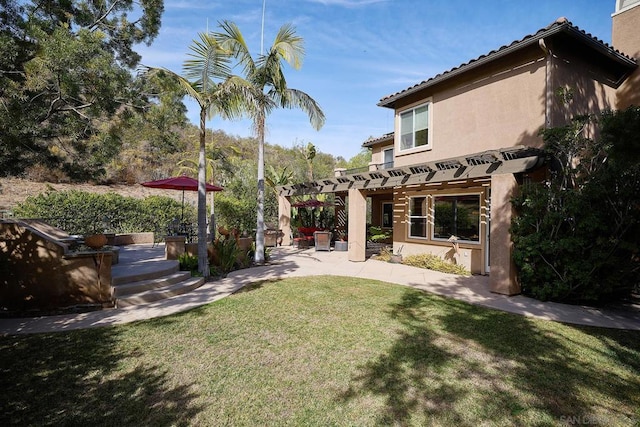 view of yard featuring a pergola and a patio