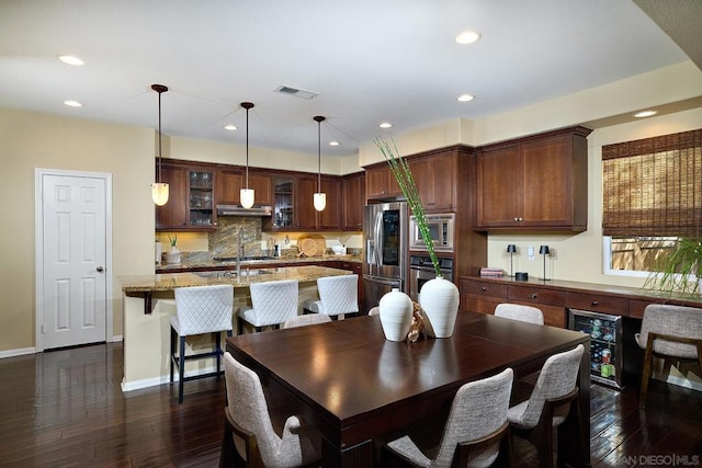 dining room featuring dark wood-type flooring