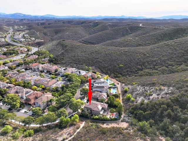 bird's eye view with a mountain view